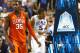 GREENSBORO, NC - MARCH 14: Landry Nnoko #35 of the Clemson Tigers watches as Rodney Hood #5 of the Duke Blue Devils reacts after a play during the quarterfinals of the 2014 Men's ACC Basketball Tournament at Greensboro Coliseum on March 14, 2014 in Green