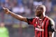MILAN, ITALY - MARCH 16: Mario Balotelli of AC Milan reacts during the Serie A match between AC Milan and Parma FC at San Siro Stadium on March 16, 2014 in Milan, Italy. (Photo by Claudio Villa/Getty Images)
