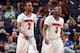MEMPHIS, TN - MARCH 15: Russ Smith #2 and Chris Jones #3 of the Louisville Cardinals walk towards the bench against the Connecticut Huskies during the Championship of the American Athletic Conference Tournament at FedExForum on March 15, 2014 in Memphis,