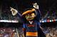GREENSBORO, NC - MARCH 16: The Virginia Cavaliers mascot tries to rally their fans during their game against the Duke Blue Devils in the finals of the 2014 Men's ACC Basketball Tournament at Greensboro Coliseum on March 16, 2014 in Greensboro, North Caro