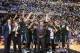 INDIANAPOLIS, IN - MARCH 16: The Michigan State Spartans celebrate after the 69-55 win over the Michigan Wolverines during the finals of the Big Ten Basketball Tournament at Bankers Life Fieldhouse on March 16, 2014 in Indianapolis, Indiana. (Photo by