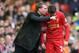 LIVERPOOL, ENGLAND - DECEMBER 21: Liverpool manager Brendan Rodgers speaks with Joe Allen during the Barclays Premier League match between Liverpool and Cardiff City at Anfield at Anfield on December 21, 2013 in Liverpool, England. (Photo by Clive Brun