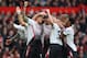 MANCHESTER, ENGLAND - MARCH 16: Steven Gerrard of Liverpool celebrates scoring the first goal with his team-mates during the Barclays Premier League match between Manchester United and Liverpool at Old Trafford on March 16, 2014 in Manchester, England.