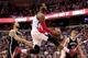 WASHINGTON, DC - MARCH 15: John Wall #2 of the Washington Wizards puts up a shot during the second half of the Wizards 101-94 win over the Brooklyn Nets at Verizon Center on March 15, 2014 in Washington, DC. NOTE TO USER: User expressly acknowledges and