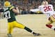 Jan 5, 2014; Green Bay, WI, USA; Green Bay Packers wide receiver Jordy Nelson (87) catches a touchdown pass as San Francisco 49ers cornerback Tramaine Brock (26) defends during the second quarter of the 2013 NFC wild card playoff football game at Lambeau