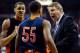 LAS VEGAS, NV - DECEMBER 14: Head coach Tim Floyd of the UTEP Miners talks to his players Gabriel McCulley #23 and D'Von Campbell #55 during their game against the UNLV Rebels at the Thomas & Mack Center December 14, 2011 in Las Vegas, Nevada. UNLV won 6