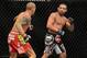 Dec 28, 2013; Las Vegas, NV, USA; Dustin Poirier (red gloves) and Diego Brandao (blue gloves) fight during their UFC middleweight bout at the MGM Grand Garden Arena. Mandatory Credit: Jayne Kamin-Oncea-USA TODAY Sports