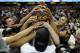 Mar 15, 2014; Anaheim, CA, USA; Cal Poly Mustangs players celebrate after their game against the Cal State Northridge Matadors in the championship game of the Big West Conference college basketball tournament at Honda Center. The Mustangs won 61-59. Manda