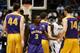 DAYTON, OH - MARCH 18: DJ Evans #3 celebrates with John Puk #44 and Sam Rowley #14 of the Albany Great Danes during their 71 to 64 win over the Mount St. Mary's Mountaineers during the first round of the 2014 NCAA Men's Basketball Tournament at at Univer