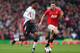 MANCHESTER, ENGLAND - MARCH 16: Daniel Sturridge of Liverpool competes with Michael Carrick of Manchester United during the Barclays Premier League match between Manchester United and Liverpool at Old Trafford on March 16, 2014 in Manchester, England. (