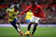 MANCHESTER, ENGLAND - DECEMBER 07: Nani of Manchester United is pursued by Vurnon Anita of Newcastle during the Barclays Premier League match between Manchester United and Newcastle United at Old Trafford on December 7, 2013 in Manchester, England. (Pho