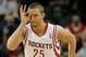 HOUSTON, TX - JANUARY 24: Chandler Parsons #25 of the Houston Rockets celebrates a three-pointer against the Memphis Grizzlies during the game at the Toyota Center on January 24, 2014 in Houston, Texas. NOTE TO USER: User expressly acknowledges and agree