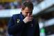LONDON, ENGLAND - MARCH 16: Tim Sherwood manager of Tottenham Hotspur wipes his face during the Barclays Premier League match between Tottenham Hotspur and Arsenal at White Hart Lane on March 16, 2014 in London, England. (Photo by Paul Gilham/Getty Imag