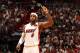 MIAMI, FL - March 16: LeBron James #6 of the Miami Heat looks on against the Houston Rockets at the American Airlines Arena in Miami, Florida on March 16 2014. NOTE TO USER: User expressly acknowledges and agrees that, by downloading and/or using this pho