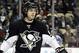 Jan 22, 2014; Pittsburgh, PA, USA; Pittsburgh Penguins defenseman Kris Letang (58) at the face-off circle against the Montreal Canadiens during the third period at the CONSOL Energy Center. The Penguins won 5-1. Mandatory Credit: Charles LeClaire-USA TODA
