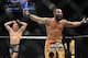 Nov 16, 2013; Las Vegas, NV, USA; Georges St-Pierre (red gloves) and Johny Hendricks (blue gloves) react after their welterweight championship bout during UFC 167 at MGM Grand Garden Arena. Mandatory Credit: Stephen R. Sylvanie-USA TODAY Sports