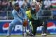 JOHANNESBURG, SOUTH AFRICA - SEPTEMBER 24: Misbah-ul-Haq of Pakistan in action with MS Dhoni of India looking on during the Twenty20 Championship Final match between Pakistan and India at The Wanderers Stadium on September 24, 2007 in Johannesburg, South