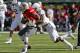 EUGENE, OR - AUGUST 31: Line backer Torrodney Prevot #86 of the Oregon Ducks sacks quarter back Kalen Henderson #19 of the Nicholls State Colonels in the fourth quarter on August 31, 2013 at Autzen Stadium in Eugene, Oregon. Oregon won 66-3. (Photo by Ch
