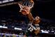 INDIANAPOLIS, IN - MARCH 16: Branden Dawson #22 of the Michigan State Spartans dunks against the Michigan Wolverines during the 2014 Big Ten Men's Championship at Bankers Life Fieldhouse on March 16, 2014 in Indianapolis, Indiana. (Photo by Andy Lyons/G