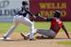 TAMPA, FL - MARCH 16: B.J. Upton #2 of the Atlanta Braves slides in under the tag of second baseman Eduardo Nunez #26 of the New York Yankees for a steal during a spring training game at George M. Steinbrenner Field on March 16, 2014 in Tampa, Florida.