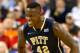 GREENSBORO, NC - MARCH 14: Talib Zanna #42 of the Pittsburgh Panthers reacts after a basket against the North Carolina Tar Heels during the quarterfinals of the 2014 Men's ACC Basketball Tournament at Greensboro Coliseum on March 14, 2014 in Greensboro,