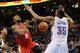 Mar 4, 2014; Oklahoma City, OK, USA; Philadelphia 76ers shooting guard Tony Wroten (8) loses control of the ball while attempting a shot against Oklahoma City Thunder small forward Kevin Durant (35) during the second quarter at Chesapeake Energy Arena. Ma