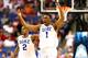 GREENSBORO, NC - MARCH 15: Teammates Quinn Cook #2 and Jabari Parker #1 of the Duke Blue Devils run down the court against the North Carolina State Wolfpack during the semifinals of the 2014 Men's ACC Basketball Tournament at Greensboro Coliseum on March