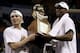 Mar 9, 2014; St. Louis, MO, USA; Wichita State Shockers guard Fred VanVleet 23) and teammate forward Cleanthony Early (11) hold the conference trophy after the championship game of the Missouri Valley Conference basketball tournament against the Indiana