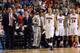 LAS VEGAS, NV - MARCH 15: Gabe York #1 of the Arizona Wildcats reacts as head coach Sean Miller (L) and teammates Jordin Mayes #20 and Elliott Pitts #24 look on during a timeout in the championship game of the Pac-12 Basketball Tournament against the UCL