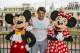 LAKE BUENA VISTA, FL - MARCH 17: In this handout photo provided by Diseny Parks, tennis legend Roger Federer poses with Mickey and Minnie Mouse at the Magic Kingdom park March 17, 2014 in Lake Buena Vista, Florida. The Swiss-born Federer holds the men's