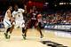 DAYTON, OH - MARCH 19: D.D. Scarver #1 of the Texas Southern Tigers carries the ball as Dave Nwaba #0 of the Cal Poly Mustangs defends during the first round of the 2014 NCAA Men's Basketball Tournament at UD Arena on March 19, 2014 in Dayton, Ohio. (Pho