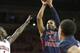 FAYETTEVILLE, AR - DECEMBER 20: Karvel Anderson #15 of the Robert Morris Colonials shoots a jump shot against the Arkansas Razorbacks at Bud Walton Arena on December 20, 2012 in Fayetteville, Arkansas. The Razorbacks defeated the Colonials 79-74. (Phot