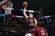Mar 16, 2014; Brooklyn, NY, USA; Saint Joseph's Hawks forward Halil Kanacevic (45) fouls on his way to the basket during the second half against the Virginia Commonwealth Rams in the championship game for the Atlantic 10 Conference college basketball tour