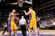 LOS ANGELES, CA - MARCH 19: Robert Sacre #50 and Pau Gasol #16 of the Los Angeles Lakers react during their game against the San Antonio Spurs at Staples Center on March 19, 2014 in Los Angeles, California. NOTE TO USER: User expressly acknowledges and ag