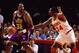 HOUSTON - MAY 25: Karl Malone #32 of the Utah Jazz posts up against Hakeem Olajuwon #34 of the Houston Rockets during Game Two of the Western Conference Finals played on May 25, 1994 at the Summitt in Houston, Texas. Houston defeated Utah 104-99 and won