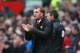 MANCHESTER, ENGLAND - MARCH 16: Liverpool Manager Brendan Rodgers encourages his players during the Barclays Premier League match between Manchester United and Liverpool at Old Trafford on March 16, 2014 in Manchester, England. (Photo by Alex Livesey/Ge