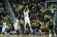 ANN ARBOR, MI - JANUARY 30: Nik Stauskas #11 of the Michigan Wolverines shoots a three-point shot during the second half of the game against the Purdue Boilermakers at Crisler Arena on January 30, 2014 in Ann Arbor, Michigan. The Wolverines defeated the