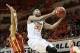 Feb 3, 2014; Stillwater, OK, USA; Oklahoma State Cowboys guard Marcus Smart (33) drives to the basket defended by Iowa State Cyclones guard Naz Long (15) at Gallagher-Iba Arena. Iowa State defeated Oklahoma State in triple overtime 98-97. Mandatory Credit