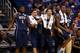 ORLANDO, FL - MARCH 20: Jamel Artis #1, James Robinson #0, Cameron Wright #3, Cameron Wright #3 and Durand Johnson #5 of the Pittsburgh Panthers celebrate late in the second half while taking on the Colorado Buffaloes during the second round of the 2014
