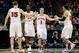 Mar 20, 2014; Milwaukee, WI, USA; Wisconsin Badgers guard Ben Brust (1) celebrates with forward Sam Dekker (15), guard Traevon Jackson (12) and forward Nigel Hayes (10) during the second round of the 2014 NCAA Tournament against the American University Ea