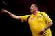 LONDON, ENGLAND - DECEMBER 27: Dave Chisnall of England in atcion during his third round match against Simon Whitlock on day eleven of the 2013 Ladbrokes.com World Darts Championship at the Alexandra Palace on December 27, 2012 in London, England. (Photo