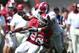 Apr 14, 2012; Tuscaloosa, AL, USA; Alabama Crimson Tide wide receiver Christion Jones (22) is tackled by linebacker Trey Depriest (33) during the spring game at Bryant Denny Stadium. Mandatory Credit: Marvin Gentry-USA TODAY Sports