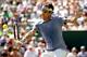 INDIAN WELLS, CA - MARCH 16: Roger Federer of Switzerland returns a shot to Novak Djokovic of Serbia during the final of the BNP Parabas Open at the Indian Wells Tennis Garden on March 16, 2014 in Indian Wells, California. (Photo by Matthew Stockman/Get