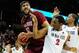 SPOKANE, WA - MARCH 20: Sim Bhullar #2 of the New Mexico State Aggies is defended by Xavier Thames #2 and Josh Davis #22 of the San Diego State Aztecs during the second round of the 2014 NCAA Men's Basketball Tournament at Spokane Veterans Memorial Arena