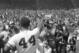 Hank Aaron waves to fans and media in 1976, the year he broke the home run record and retires from baseball.