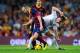 BARCELONA, SPAIN - OCTOBER 26: Andres Iniesta of FC Barcelona (L) duels for the ball with Luka Modric of Real Madrid CF during the La Liga match between FC Barcelona and Real Madrid CF at Camp Nou on October 26, 2013 in Barcelona, Spain. (Photo by David