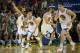 Mar 20, 2014; Oakland, CA, USA; Golden State Warriors guard Stephen Curry (30) and teammates return to defense after Curry's basket against the Milwaukee Bucks during the second quarter at Oracle Arena. Mandatory Credit: Kelley L Cox-USA TODAY Sports
