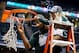 Mar 16, 2014; Indianapolis, IN, USA; Michigan State Spartans center Adreian Payne (5) cuts down the net with 8 year old cancer patient Lacey Hollsworth after defeating the Michigan Wolverines in the championship game for the Big Ten college basketball tou