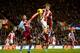 Two very contrasting styles of football will be on show at Villa Park.