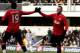 LONDON, ENGLAND - DECEMBER 18: Wayne Rooney (R) of Manchester United celebrates with teammate Danny Welbeck #19 after scoring the opening goal during the Barclays Premier League match between Queens Park Rangers and Manchester United at Loftus Road on D